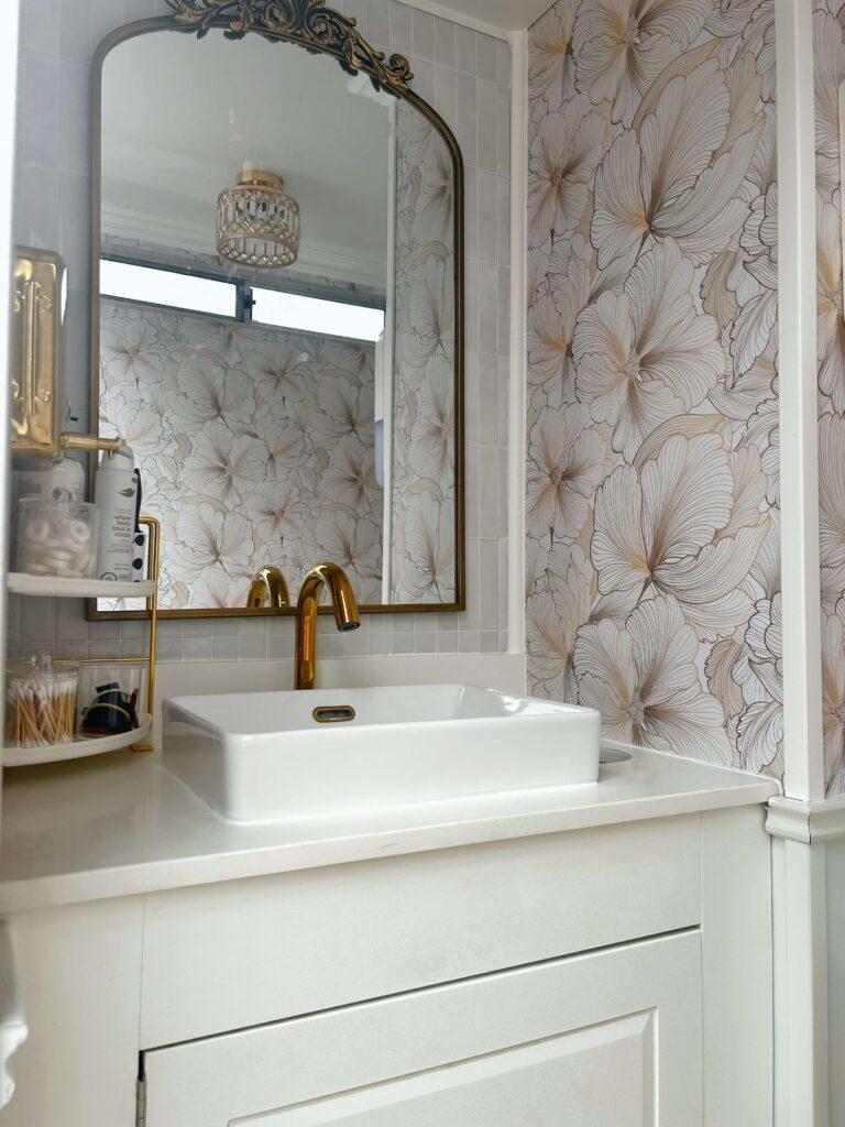 Well lit vanity area inside a luxury mobile restroom trailer for events and weddings