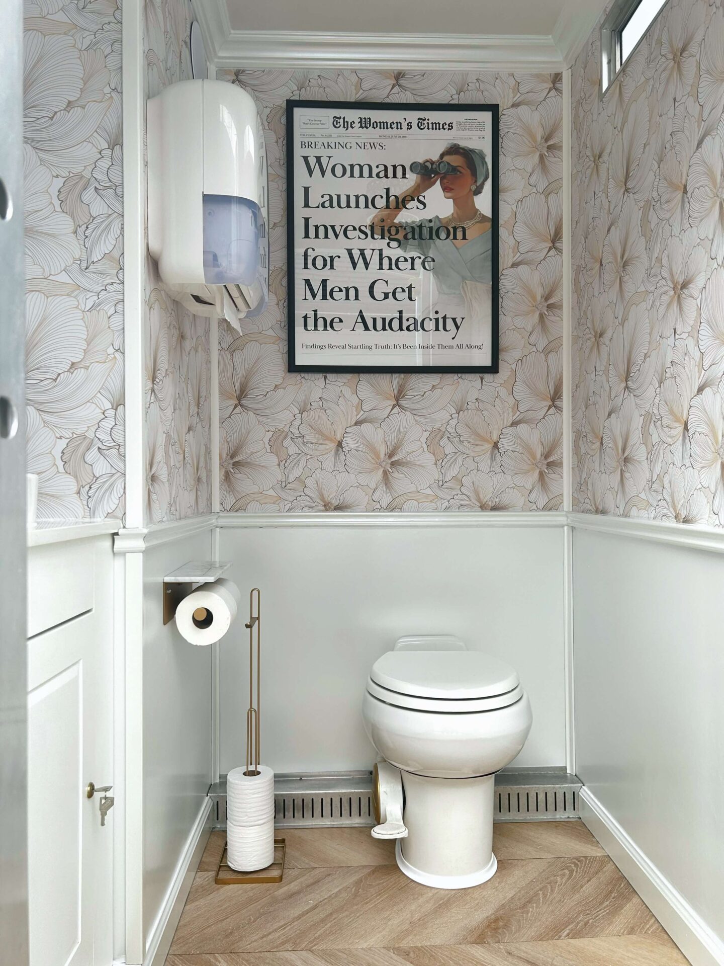 Private toilet room inside a luxury restroom trailer with decorative interior design