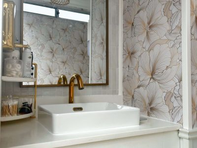 Well lit vanity area inside a luxury mobile restroom trailer for events and weddings