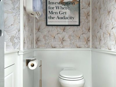 Private toilet room inside a luxury restroom trailer with decorative interior design