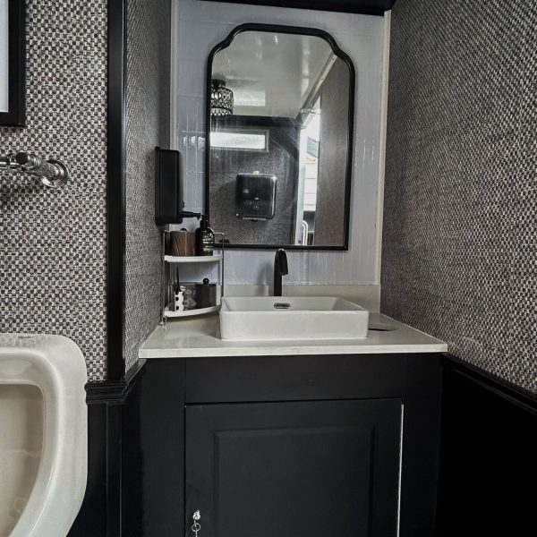Homepage 37 Front view vanity mirror inside luxury mobile restroom trailer bathroom